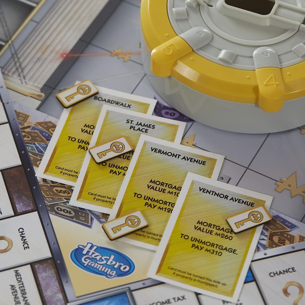 Monopoly Secret Vault Board Game for Kids Ages 8+, Family